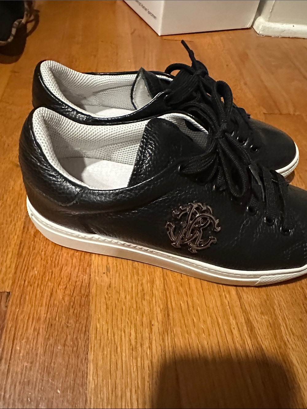 Roberto Cavalli Black Leather Low-Top Sneakers with metallic Emblem
